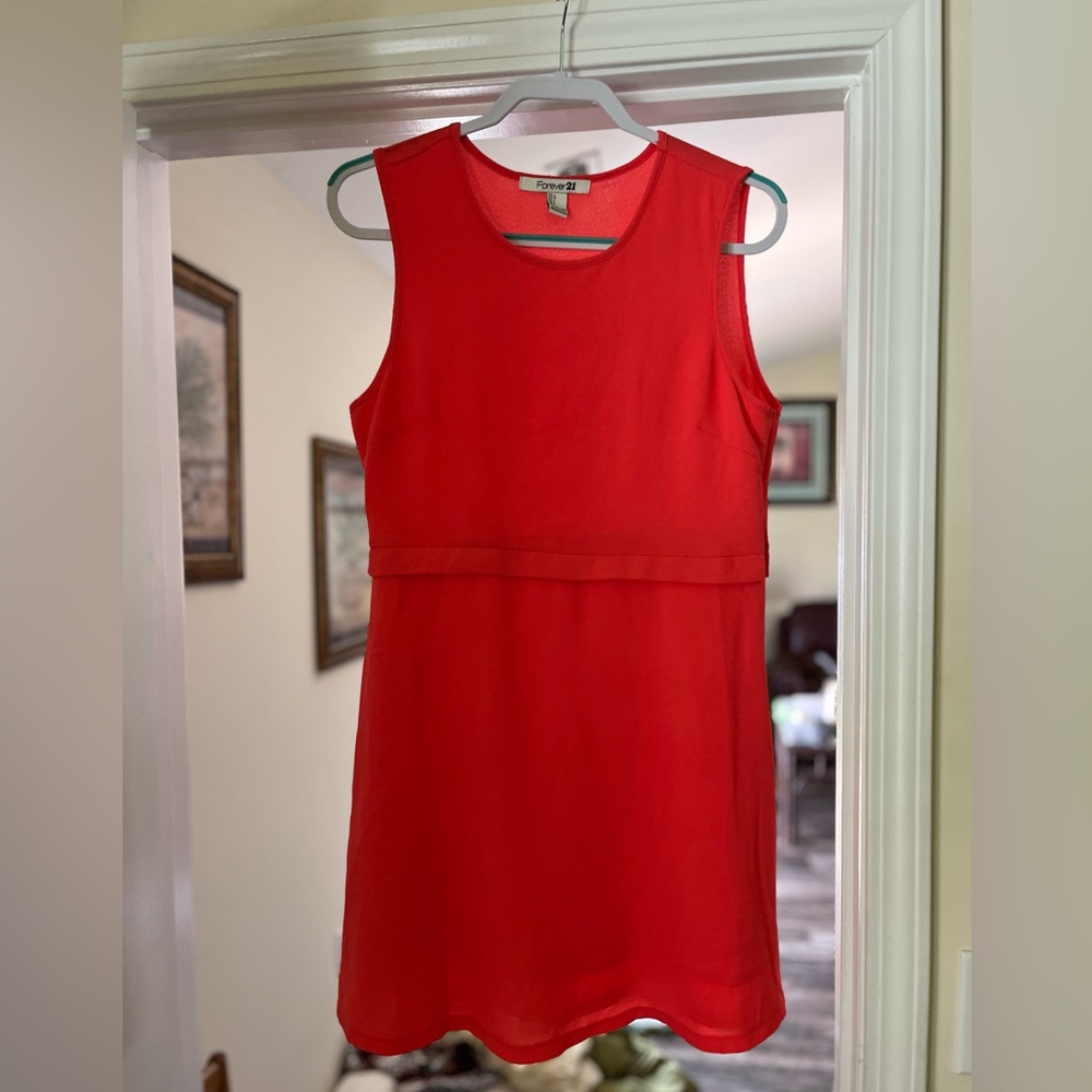 Orange dress worn once. Forever 21 size large. Zipper on the side